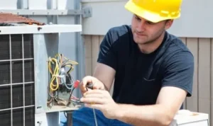 electricians-repairing-electrical-wiring-on-hvac
